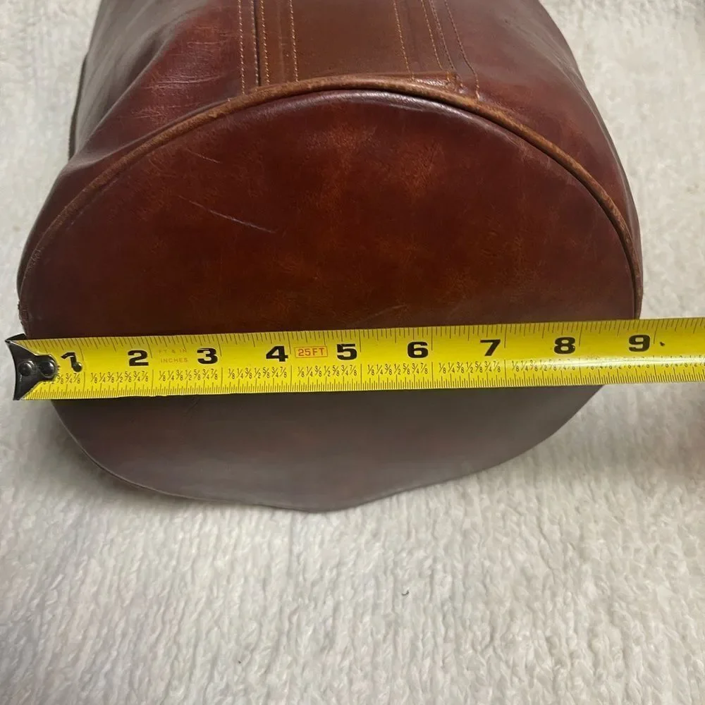 Fortune Duck vintage leather Brown sling back bucket style  bag.